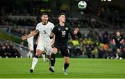 21 November 2023; Jamie McGrath of Republic of Ireland in action against Michael Boxall of New Zealand during the international friendly match between Republic of Ireland and New Zealand at the Aviva Stadium in Dublin. Photo by Seb Daly/Sportsfile