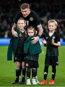 21 November 2023; James McClean of Republic of Ireland with his children, from left, Allie Mae, Willow Ivy and Junior James before the international friendly match between Republic of Ireland and New Zealand at Aviva Stadium in Dublin. Photo by Stephen McCarthy/Sportsfile