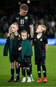 21 November 2023; James McClean of Republic of Ireland with his children, from left, Allie Mae, Willow Ivy and Junior James before the international friendly match between Republic of Ireland and New Zealand at Aviva Stadium in Dublin. Photo by Stephen McCarthy/Sportsfile Photo by Stephen McCarthy/Sportsfile