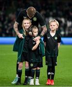 21 November 2023; James McClean of Republic of Ireland with his children, from left, Allie Mae, Willow Ivy and Junior James before the international friendly match between Republic of Ireland and New Zealand at Aviva Stadium in Dublin. Photo by Stephen McCarthy/Sportsfile