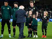 21 November 2023; James McClean of Republic of Ireland with his children, from left, Allie Mae, Willow Ivy and Junior James are greeted by President of Ireland Michael D Higgins before the international friendly match between Republic of Ireland and New Zealand at Aviva Stadium in Dublin. Photo by Stephen McCarthy/Sportsfile Photo by Stephen McCarthy/Sportsfile