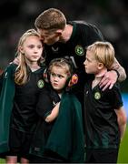 21 November 2023; James McClean of Republic of Ireland with his children, from left, Allie Mae, Willow Ivy and Junior James before the international friendly match between Republic of Ireland and New Zealand at Aviva Stadium in Dublin. Photo by Stephen McCarthy/Sportsfile