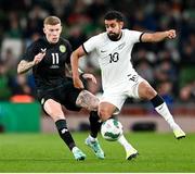 21 November 2023; Sarpreet Singh of New Zealand in action against James McClean of Republic of Ireland during the international friendly match between Republic of Ireland and New Zealand at Aviva Stadium in Dublin. Photo by Stephen McCarthy/Sportsfile