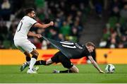 21 November 2023; James McClean of Republic of Ireland has his shirt pulled by Sarpreet Singh of New Zealand during the international friendly match between Republic of Ireland and New Zealand at Aviva Stadium in Dublin. Photo by Stephen McCarthy/Sportsfile