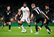 21 November 2023; Sarpreet Singh of New Zealand in action against James McClean, 11, and Andrew Omobamidele of Republic of Ireland  during the international friendly match between Republic of Ireland and New Zealand at the Aviva Stadium in Dublin. Photo by Piaras Ó Mídheach/Sportsfile