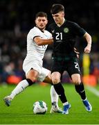 21 November 2023; Andrew Moran of Republic of Ireland in action against Libby Cacace of New Zealand during the international friendly match between Republic of Ireland and New Zealand at Aviva Stadium in Dublin. Photo by Piaras Ó Mídheach/Sportsfile
