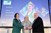 22 November 2023; Athletics Ireland Operations Team Manager Teresa McDaid collects the Track Athlete of the Year Award on behalf of Ciara Mageean from RSA Insurance Managing Director Elaine Robinson and Athletics Ireland President John Cronin during the 123.ie National Athletics Awards at Crowne Plaza Hotel in Santry, Dublin. A full list of winners from the event can be found at AthleticsIreland.ie Photo by Sam Barnes/Sportsfile