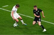 21 November 2023; Evan Ferguson of Republic of Ireland gets past Nando Pijnaker of New Zealand during the international friendly match between Republic of Ireland and New Zealand at Aviva Stadium in Dublin. Photo by Ben McShane/Sportsfile