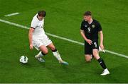 21 November 2023; Evan Ferguson of Republic of Ireland gets past Nando Pijnaker of New Zealand during the international friendly match between Republic of Ireland and New Zealand at Aviva Stadium in Dublin. Photo by Ben McShane/Sportsfile