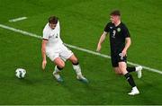 21 November 2023; Evan Ferguson of Republic of Ireland gets past Nando Pijnaker of New Zealand during the international friendly match between Republic of Ireland and New Zealand at Aviva Stadium in Dublin. Photo by Ben McShane/Sportsfile