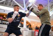 22 November 2023; Emmet Brennan and trainer Philip Keogh during public workouts, held at Liffey Valley Shopping Centre in Clondalkin, Dublin, ahead of his celtic light heavyweight title fight with Jamie Morrissey, on November 25th at 3Arena in Dublin. Photo by Stephen McCarthy/Sportsfile