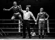 21 January 2023; (EDITORS NOTE: Image has been converted to black and white) Grainne Walsh of Spartacus Boxing Club, Offaly, left, celebrates after her victory over Amy Broadhurst of St Bronagh's ABC, Louth, in their welterweight 66kg final bout at the IABA National Elite Boxing Championships Finals at the National Boxing Stadium in Dublin. Photo by Seb Daly/Sportsfile