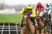 25 November 2023; State Man, with Paul Townend up, on their way to winning the Unibet Morgiana Hurdle after jumping the last on day one of the Punchestown Winter Festival at Punchestown Racecourse in Kildare. Photo by Matt Browne/Sportsfile