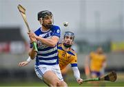25 November 2023; Ross Kelly of Naas in action against Ciaran Stacey of Na Fianna during the AIB Leinster GAA Hurling Senior Club Championship semi-final match between Naas, Kildare, and Na Fianna, Dublin, at Laois Hire O’Moore Park in Portlaoise, Laois. Photo by Stephen Marken/Sportsfile