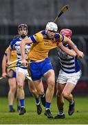 25 November 2023; John Tierney of Na Fianna in action against Seán Gainey of Naas during the AIB Leinster GAA Hurling Senior Club Championship semi-final match between Naas, Kildare, and Na Fianna, Dublin, at Laois Hire O’Moore Park in Portlaoise, Laois. Photo by Eóin Noonan/Sportsfile