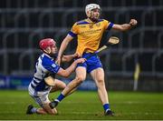 25 November 2023; John Tierney of Na Fianna in action against Seán Gainey of Naas during the AIB Leinster GAA Hurling Senior Club Championship semi-final match between Naas, Kildare, and Na Fianna, Dublin, at Laois Hire O’Moore Park in Portlaoise, Laois. Photo by Eóin Noonan/Sportsfile