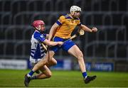 25 November 2023; John Tierney of Na Fianna in action against Seán Gainey of Naas during the AIB Leinster GAA Hurling Senior Club Championship semi-final match between Naas, Kildare, and Na Fianna, Dublin, at Laois Hire O’Moore Park in Portlaoise, Laois. Photo by Eóin Noonan/Sportsfile