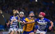 25 November 2023; Diarmuid Clerkin of Na Fianna in action against Seán Gainey of Naas during the AIB Leinster GAA Hurling Senior Club Championship semi-final match between Naas, Kildare, and Na Fianna, Dublin, at Laois Hire O’Moore Park in Portlaoise, Laois. Photo by Eóin Noonan/Sportsfile