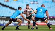 25 November 2023; Connacht captain Jack Carty attempts to get past Reinhardt Ludwig, left, and Wilco Louw of Vodacom Bulls during the United Rugby Championship match between Vodacom Bulls and Connacht at Loftus Versfeld Stadium in Pretoria, South Africa. Photo by Shaun Roy/Sportsfile