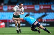 25 November 2023; Connacht captain Jack Carty is tackled by Marco van Staden of Vodacom Bulls during the United Rugby Championship match between Vodacom Bulls and Connacht at Loftus Versfeld Stadium in Pretoria, South Africa. Photo by Shaun Roy/Sportsfile
