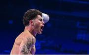 25 November 2023; John Cooney celebrates defeating Liam Gaynor in the first round of their BBBC Celtic super-featherweight bout at the 3Arena in Dublin. Photo by Stephen McCarthy/Sportsfile