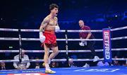 25 November 2023; John Cooney celebrates defeating Liam Gaynor in the first round of their BBBC Celtic super-featherweight bout at the 3Arena in Dublin. Photo by Stephen McCarthy/Sportsfile