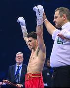 25 November 2023; John Cooney is declared victorious over Liam Gaynor in their BBBC Celtic super-featherweight bout at the 3Arena in Dublin. Photo by Stephen McCarthy/Sportsfile