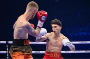 25 November 2023; John Cooney, right, and Liam Gaynor during their BBBC Celtic super-featherweight bout at the 3Arena in Dublin. Photo by Stephen McCarthy/Sportsfile