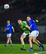 25 November 2023; AJ Gallagher of Naomh Conaill in action against Ciaran McFaul of Glen during the AIB Ulster GAA Football Senior Club Championship semi-final match between Glen, Derry, and Naomh Conaill, Donegal, at Healy Park in Omagh, Tyrone. Photo by Ben McShane/Sportsfile