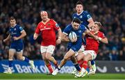 25 November 2023; Hugo Keenan of Leinster is tackled by Craig Casey of Munster during the United Rugby Championship match between Leinster and Munster at the Aviva Stadium in Dublin. Photo by Sam Barnes/Sportsfile