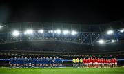 25 November 2023; Leinster and Munster players observe a minute's silence before the United Rugby Championship match between Leinster and Munster at the Aviva Stadium in Dublin. Photo by Harry Murphy/Sportsfile