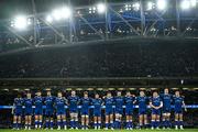 25 November 2023; Leinster players observe a minute's silence before the United Rugby Championship match between Leinster and Munster at the Aviva Stadium in Dublin. Photo by Harry Murphy/Sportsfile