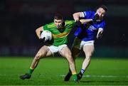 25 November 2023; Ciaran McFaul of Glen in action against Eunan Doherty of Naomh Conaill during the AIB Ulster GAA Football Senior Club Championship semi-final match between Glen, Derry, and Naomh Conaill, Donegal, at Healy Park in Omagh, Tyrone. Photo by Ben McShane/Sportsfile