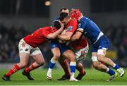 25 November 2023; Jean Kleyn of Munster is tackled by Josh van der Flier of Leinster during the United Rugby Championship match between Leinster and Munster at the Aviva Stadium in Dublin. Photo by David Fitzgerald/Sportsfile