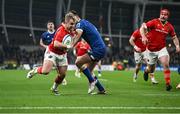 25 November 2023; Craig Casey of Munster on his way to scoring his side's first try during the United Rugby Championship match between Leinster and Munster at the Aviva Stadium in Dublin. Photo by David Fitzgerald/Sportsfile