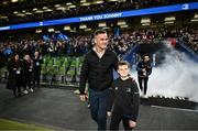 25 November 2023; Former Leinster captain Jonathan Sexton is introduced to the crowd alongside his son Luca before the United Rugby Championship match between Leinster and Munster at the Aviva Stadium in Dublin. Photo by Harry Murphy/Sportsfile