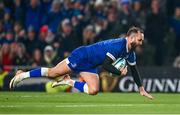 25 November 2023; Jamison Gibson-Park of Leinster dives over to score his side's first try during the United Rugby Championship match between Leinster and Munster at the Aviva Stadium in Dublin. Photo by Harry Murphy/Sportsfile