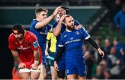 25 November 2023; Jamison Gibson-Park of Leinster celebrates with teammates Caelan Doris and Garry Ringrose after scoring his side's first try during the United Rugby Championship match between Leinster and Munster at the Aviva Stadium in Dublin. Photo by Harry Murphy/Sportsfile