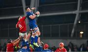 25 November 2023; Joe McCarthy of Leinster wins possession in a line-out ahead of Tom Ahern of Munster during the United Rugby Championship match between Leinster and Munster at the Aviva Stadium in Dublin. Photo by Tyler Miller/Sportsfile