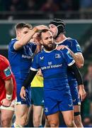25 November 2023; Jamison Gibson-Park of Leinster celebrates with teammates Caelan Doris and Garry Ringrose after scoring his side's first try during the United Rugby Championship match between Leinster and Munster at the Aviva Stadium in Dublin. Photo by Harry Murphy/Sportsfile