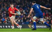 25 November 2023; Calvin Nash of Munster in action against Jack Conan of Leinster during the United Rugby Championship match between Leinster and Munster at the Aviva Stadium in Dublin. Photo by Tyler Miller/Sportsfile