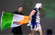 25 November 2023; Thomas Carty walks out with UFC fighter Johnny Walker before his heavyweight bout against Dan Garber at the 3Arena in Dublin. Photo by Stephen McCarthy/Sportsfile