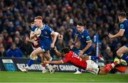 25 November 2023; Ciarán Frawley of Leinster in action against Antoine Frisch of Munster during the United Rugby Championship match between Leinster and Munster at the Aviva Stadium in Dublin. Photo by Sam Barnes/Sportsfile