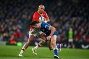 25 November 2023; Simon Zebo of Munster is tackled by Hugo Keenan of Leinster during the United Rugby Championship match between Leinster and Munster at the Aviva Stadium in Dublin. Photo by Sam Barnes/Sportsfile