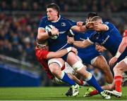 25 November 2023; Joe McCarthy of Leinster is tackled by Alex Kendellen of Munster during the United Rugby Championship match between Leinster and Munster at the Aviva Stadium in Dublin. Photo by Harry Murphy/Sportsfile