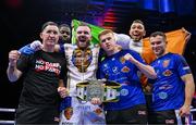 25 November 2023; Thomas Carty, with his backroom team, after defeating Dan Garber in their heavyweight bout at the 3Arena in Dublin. Photo by Stephen McCarthy/Sportsfile