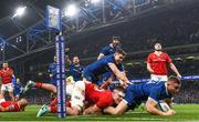 25 November 2023; Jordan Larmour of Leinster celebrates with teammate Garry Ringrose of Leinster after scoring his side's third try during the United Rugby Championship match between Leinster and Munster at the Aviva Stadium in Dublin. Photo by Harry Murphy/Sportsfile