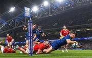 25 November 2023; Jordan Larmour of Leinster dives over to score his side's third try during the United Rugby Championship match between Leinster and Munster at the Aviva Stadium in Dublin. Photo by Harry Murphy/Sportsfile