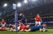 25 November 2023; Jordan Larmour of Leinster celebrates with teammate Garry Ringrose of Leinster after scoring his side's third try during the United Rugby Championship match between Leinster and Munster at the Aviva Stadium in Dublin. Photo by Harry Murphy/Sportsfile