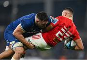 25 November 2023; Shay McCarthy of Munster is tackled by Jack Conan of Leinster during the United Rugby Championship match between Leinster and Munster at the Aviva Stadium in Dublin. Photo by David Fitzgerald/Sportsfile
